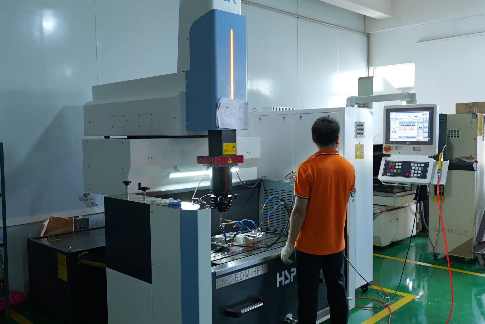 Workshop bay with EDM, milling and fitting stations